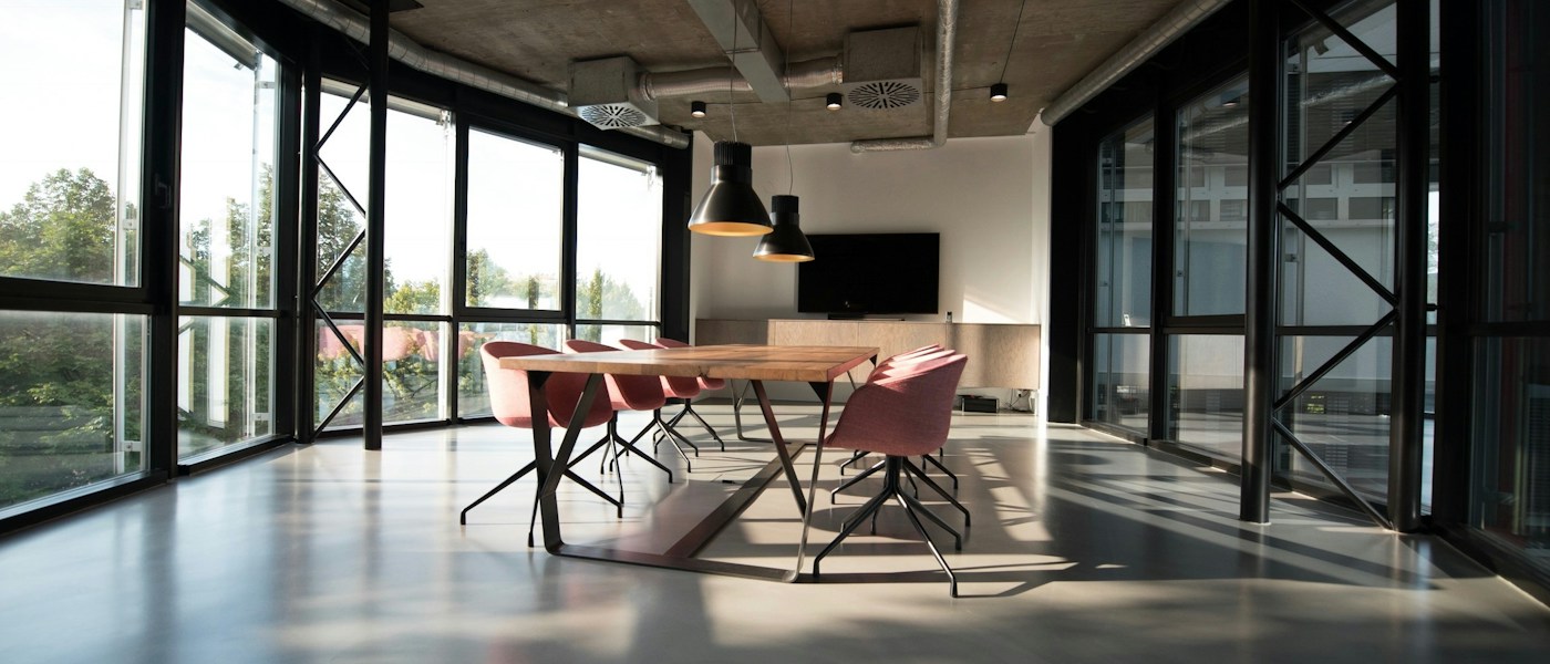 Warm, naturally lit workspace with a shared table